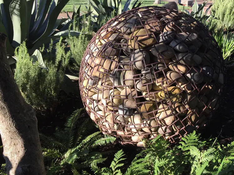 Metal sphere filled with rocks